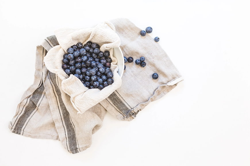 Fresh Blueberries in Bowl on Linen Cloth
