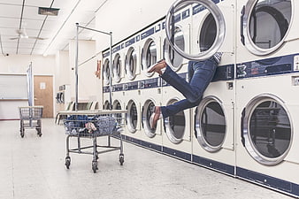 Woman stuck inside washing machine at laundromat
