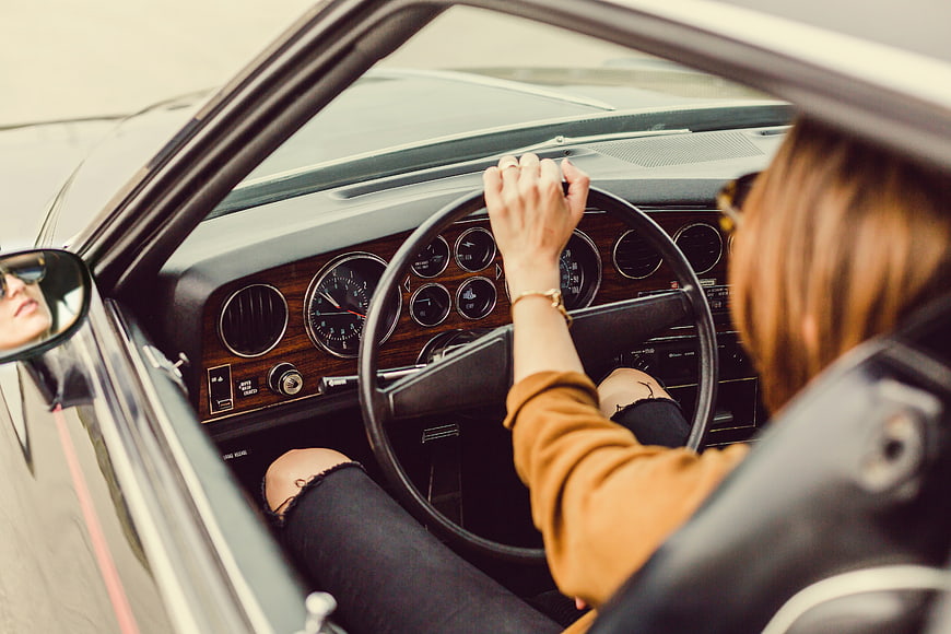 Woman Driving Vintage Classic Car Interior