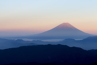 Misty Mount Fuji Sunrise Over Blue Mountain Layers