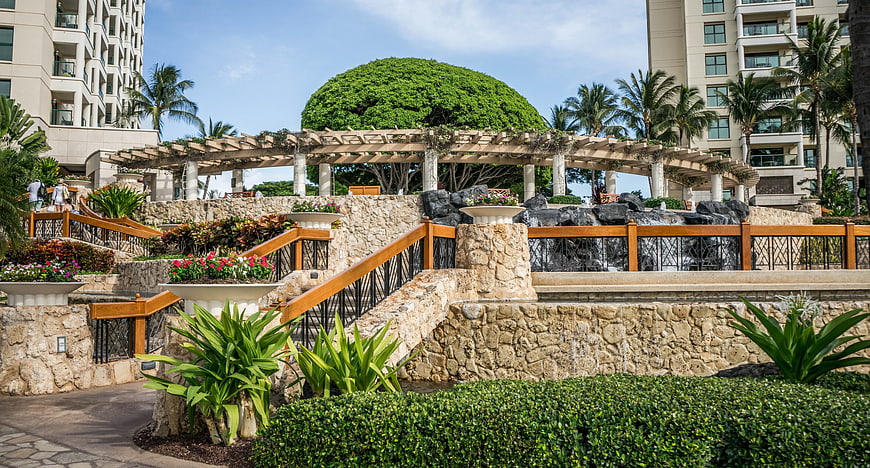 Tropical Resort Garden with Pergola and Waterfall