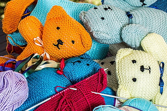 Colorful Knitted Teddy Bears and Yarn Balls