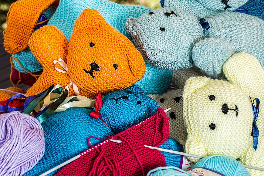 Colorful Knitted Teddy Bears and Yarn Balls