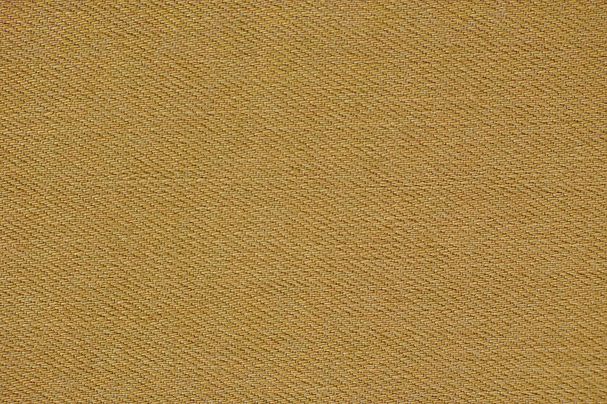 Close-up of Woven Yellow Fabric Texture Background