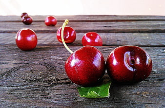 Fresh Red Cherries on Rustic Wooden Table
