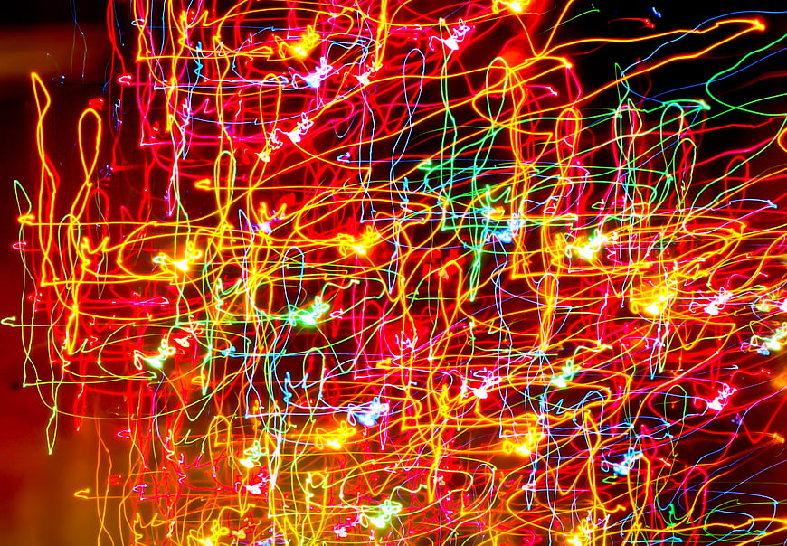 Abstract Neon Light Trails on Black Background