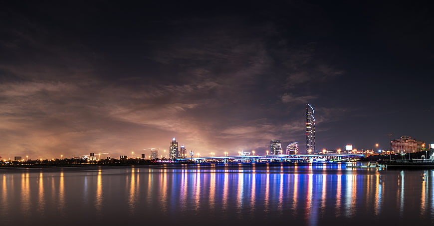 Night Skyline of Doha with Reflections on Water