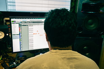 Music Producer Working in Recording Studio