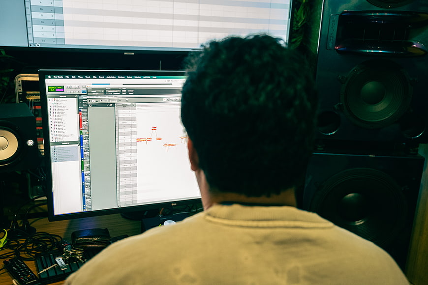 Music Producer Working in Recording Studio