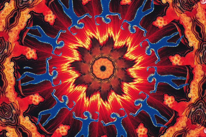 Abstract kaleidoscope pattern with blue figures and red background