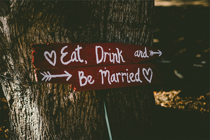Rustic Wooden Wedding Sign on Tree Trunk