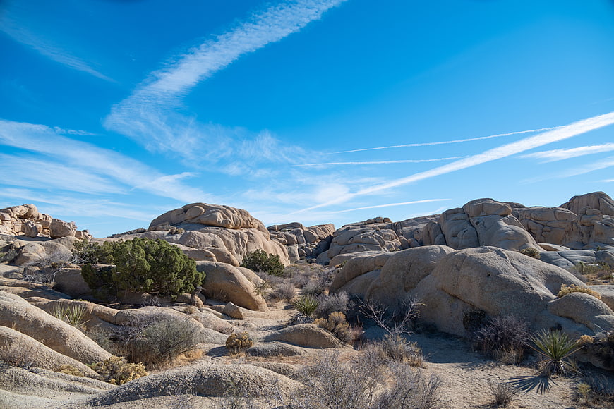 Desert Landscape with Granite Boulders and Blue Sky