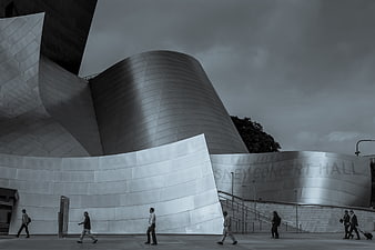 Black and white architecture of Disney Concert Hall with people