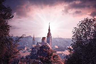 Dreamy Pink Church Tower in Historic European City