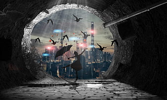 Silhouette of woman dancing with umbrella in tunnel looking at city