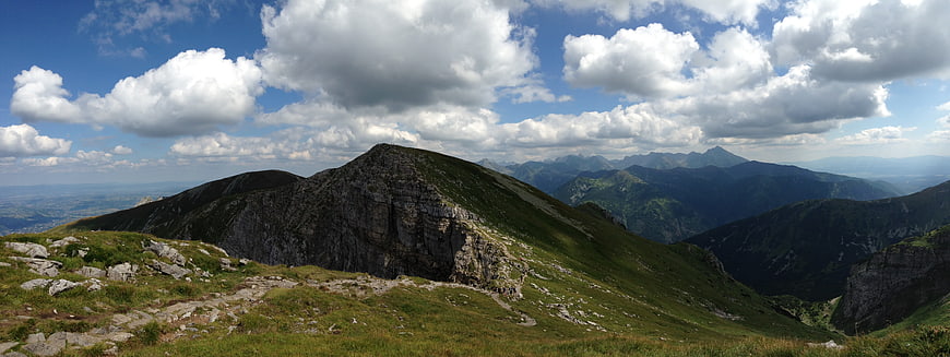Panoramic View of High Tatras Mountain Range with Clouds
