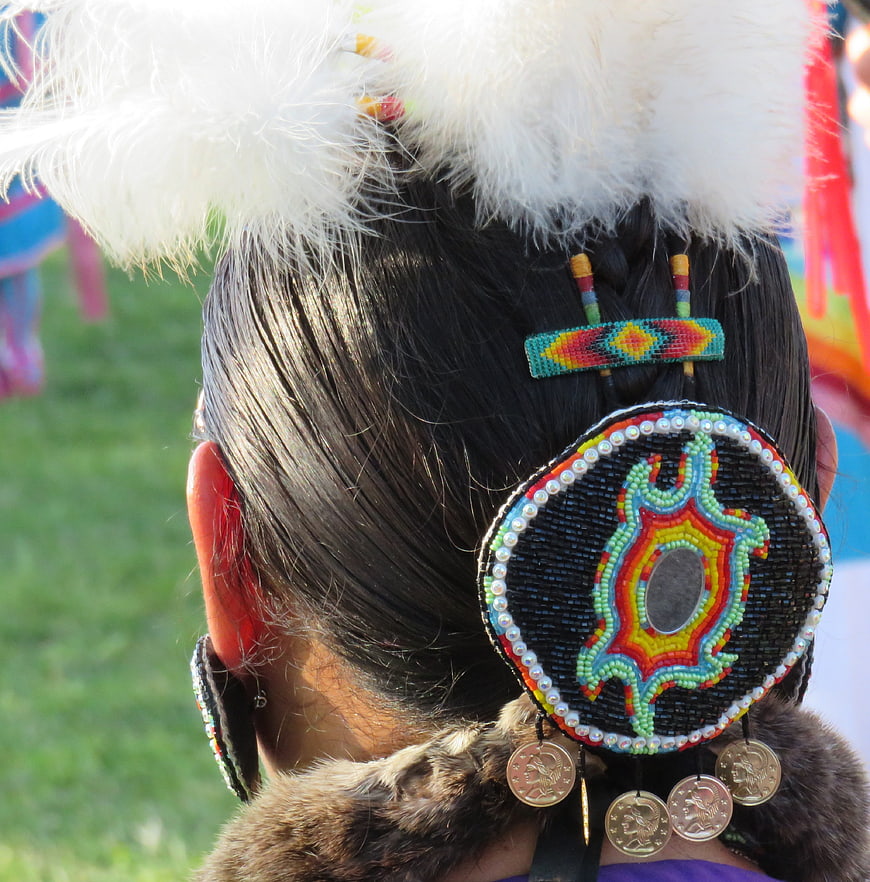 Close-up of Native American Regalia Beadwork and Feather Headdress