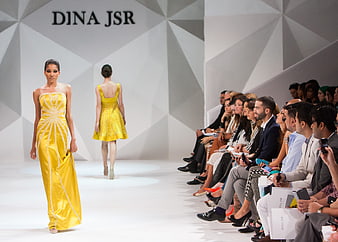 Fashion Model in Yellow Gown on Runway