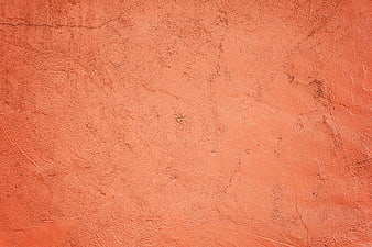 Textured Orange Plaster Wall Surface Background