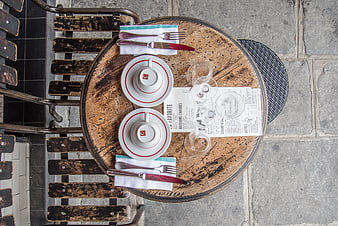 Top View of Outdoor Cafe Table Setting with Coffee Cups