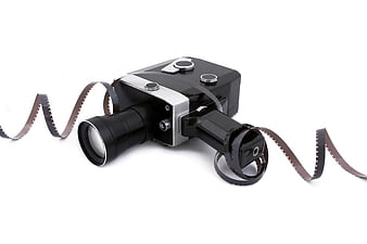 Vintage 8mm Film Camera with Filmstrip on White Background
