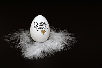 White Easter Egg with Calligraphy on White Feathers