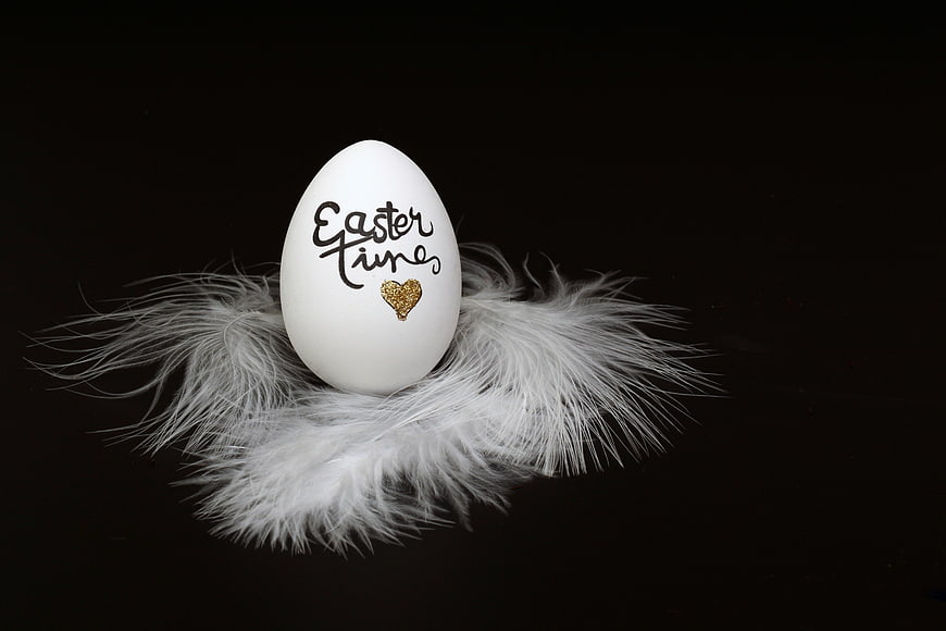 White Easter Egg with Calligraphy on White Feathers