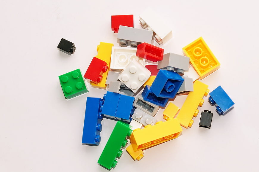 Colorful Plastic Building Blocks on White Background