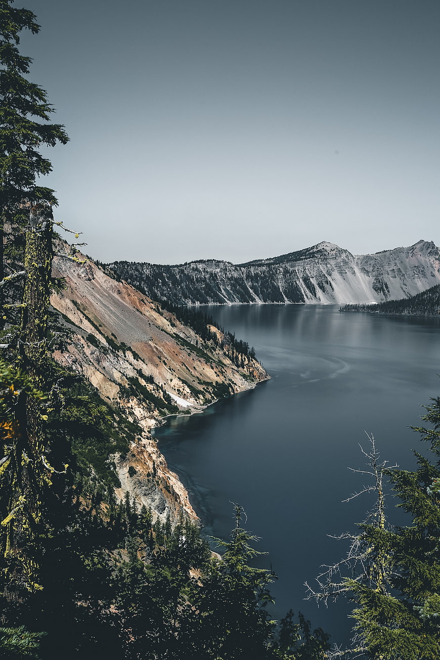 Serene Crater Lake Mountain Landscape with Pine Trees