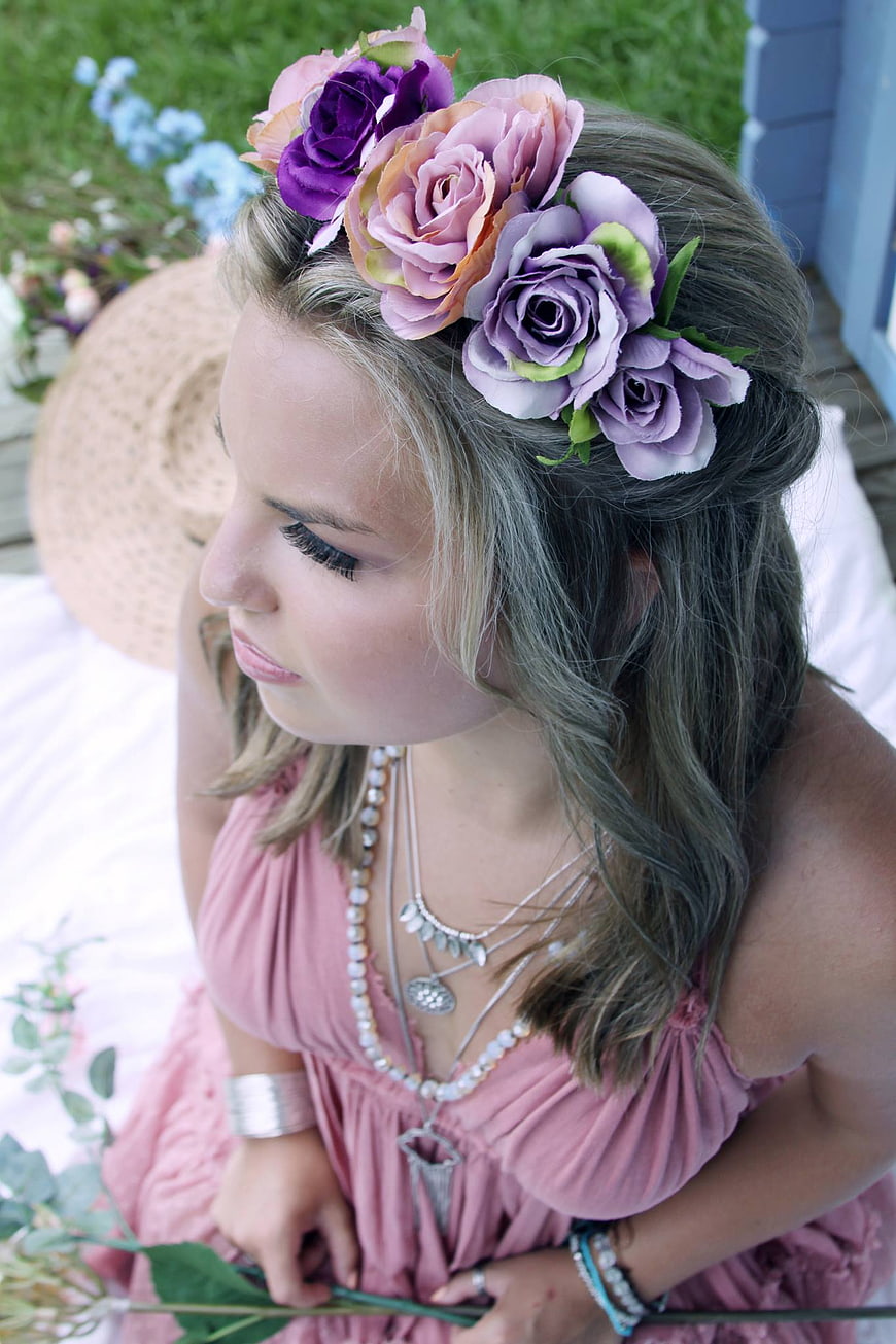 Young Woman Wearing Floral Headpiece and Pink Dress