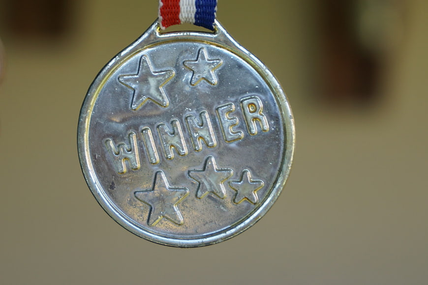 Close-up of Silver Winner Medal with Stars