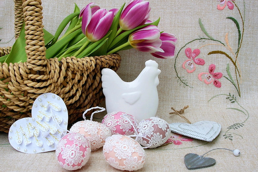 Easter Composition With Tulips, Wicker Basket, And Decorated Eggs