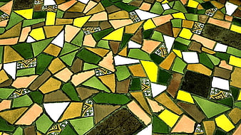 Close-up colorful mosaic floor texture pattern with green and yellow tiles