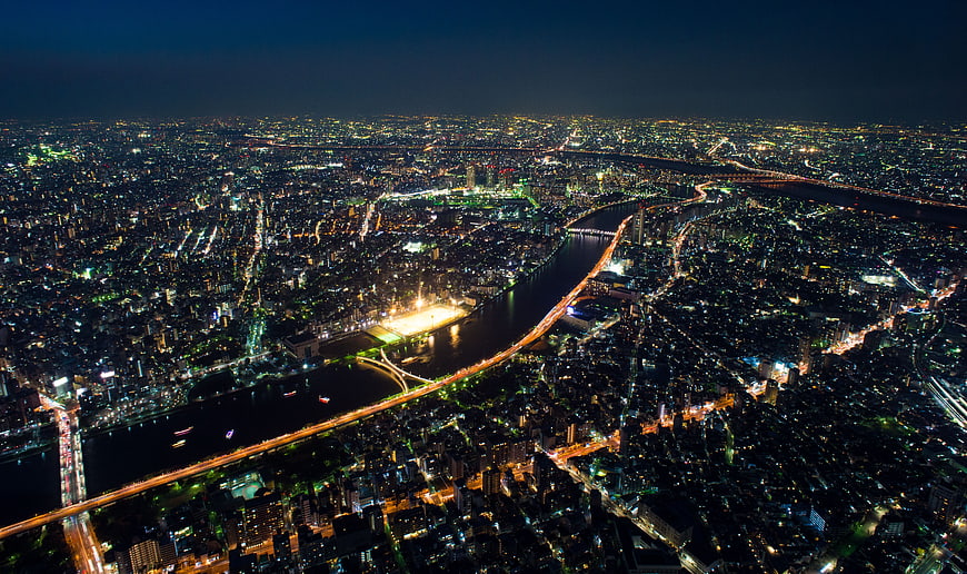 Aerial Night View of Tokyo Cityscape with Rainbow Bridge and Sumida River