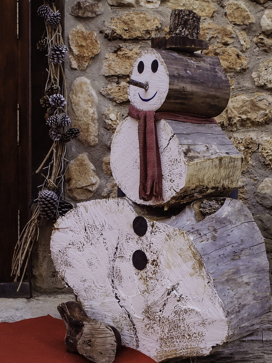 Rustic Wooden Snowman Sculpture with Red Scarf