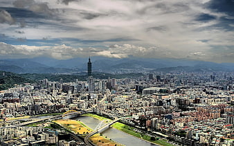 Aerial View of Taipei Cityscape with Taipei 101 and Mountains