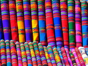 Vibrant Colorful Woven Textiles and Fabric Rolls