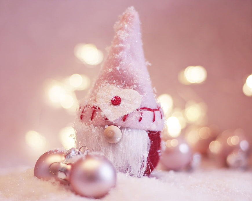 Pink Christmas Gnome Figurine With Snow And Bokeh Lights