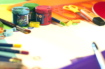 Colorful School Art Supplies Arranged On White Paper