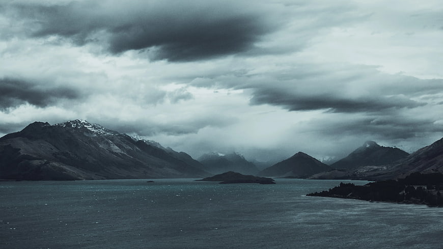 Dramatic Lake Wakatipu Landscape with Snowy Mountains