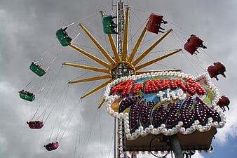 Colorful Travel the World Swing Ride at Carnival Fair