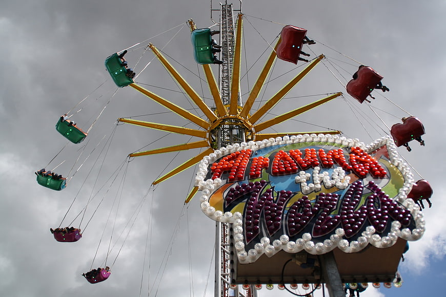 Colorful Travel the World Swing Ride at Carnival Fair
