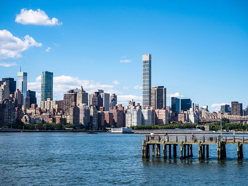 Manhattan Skyline View from East River with Wooden Pier