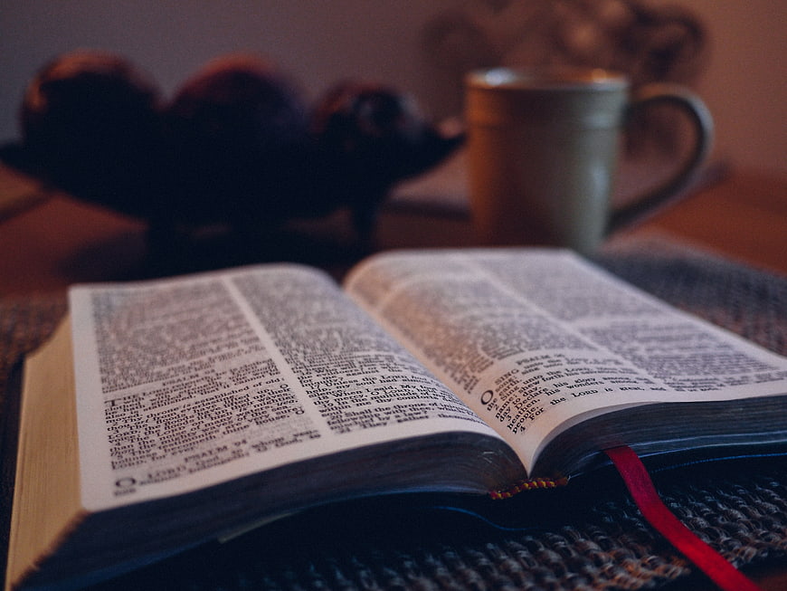 Open Bible with Coffee Mug and Fruit Bowl