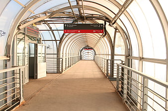 Empty Covered Pedestrian Walkway at Train Station