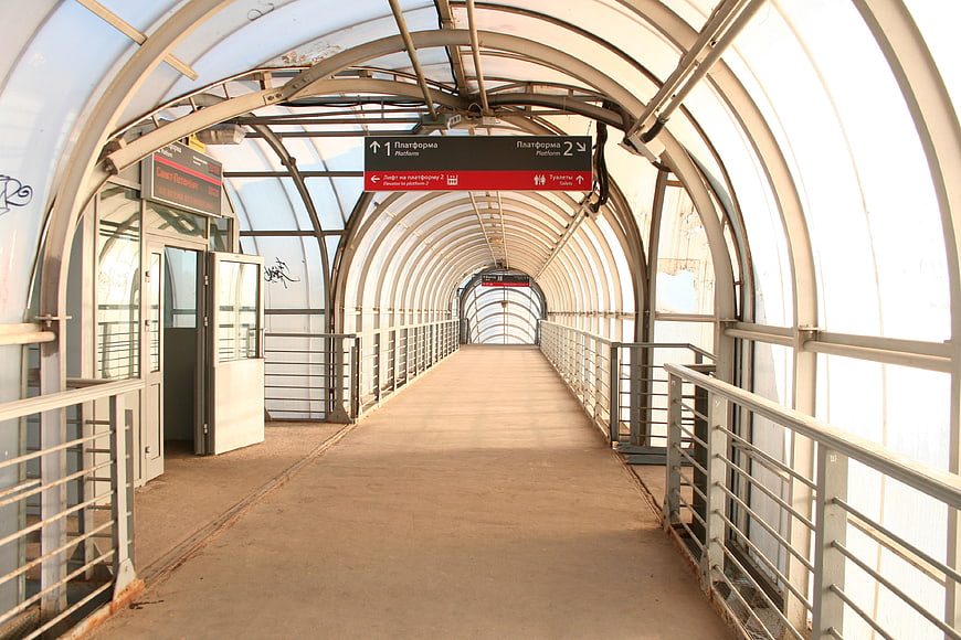 Empty Covered Pedestrian Walkway at Train Station