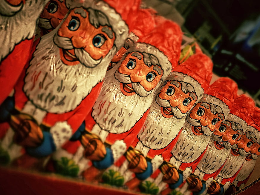 Row of Santa Claus Chocolate Figurines