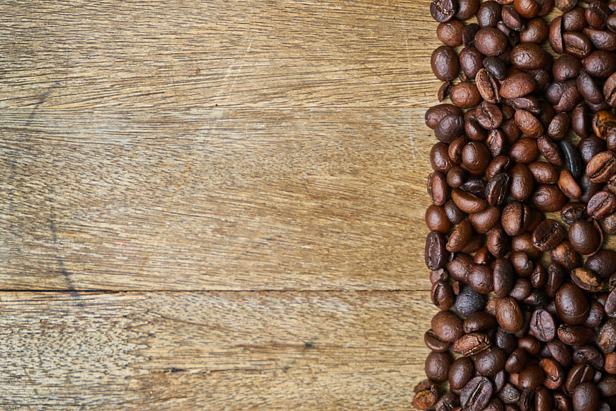 Roasted Coffee Beans on Rustic Wooden Background