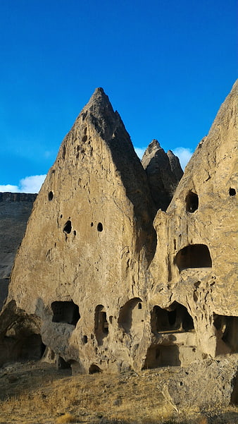 Ancient rock-cut dwellings in Goreme, Cappadocia, Turkey