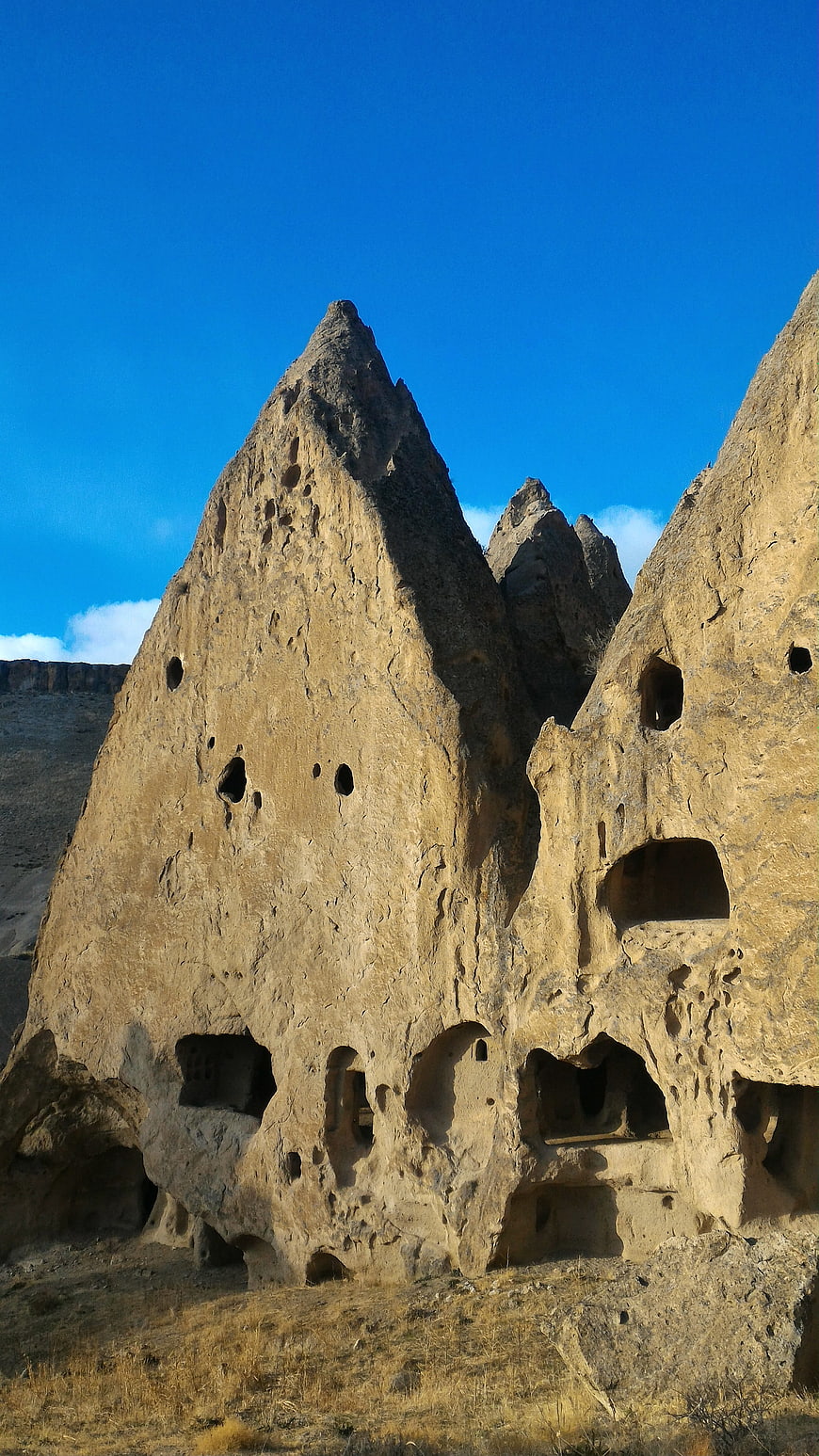 Ancient rock-cut dwellings in Goreme, Cappadocia, Turkey